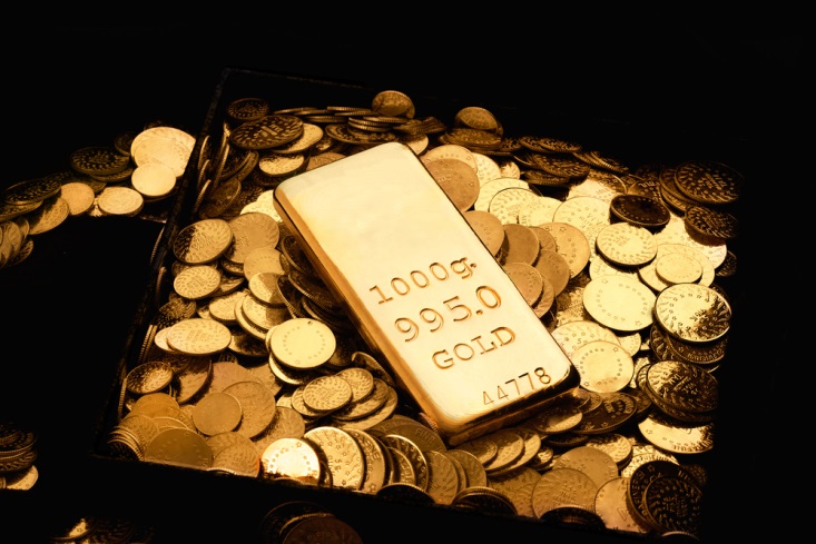 Finance Brokerage – Gold spot price: golden bar and coins for gold spot price concept