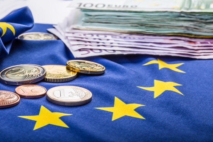 coins and bills on eurozone flag. Stock exchanges concept – financebrokerage 