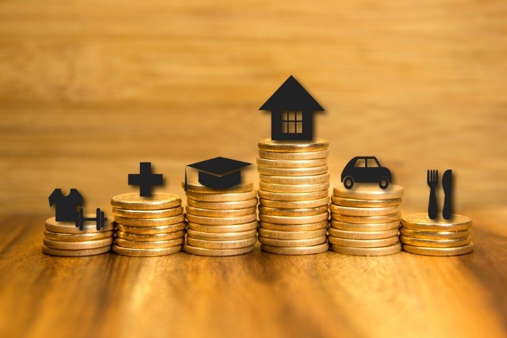Piles of coins beside each other with logos of loan options on top of them.